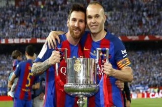 Andrés Iniesta y Messi.