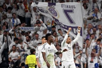 Mbappé celebra la clasificación del Real Madrid a los octavos de final de la Champions. Foto: AFP.