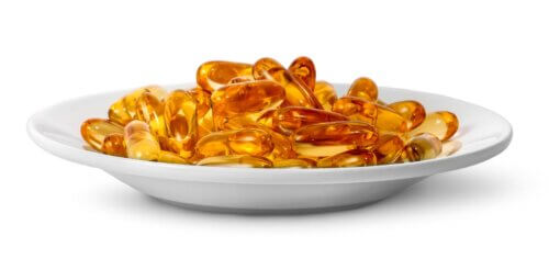 75279880 fish oil omega 3 on plate